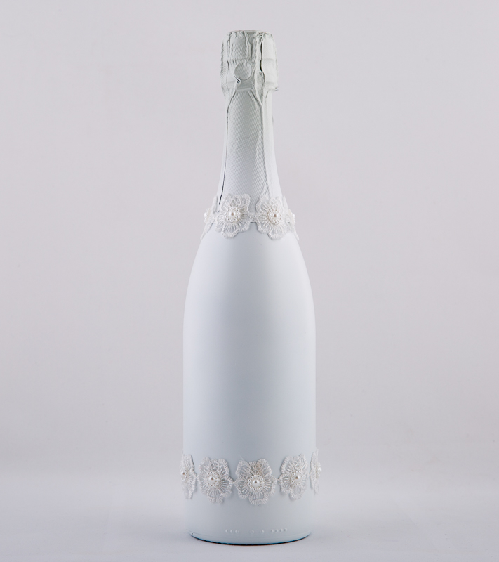 Wedding champagne with white lace