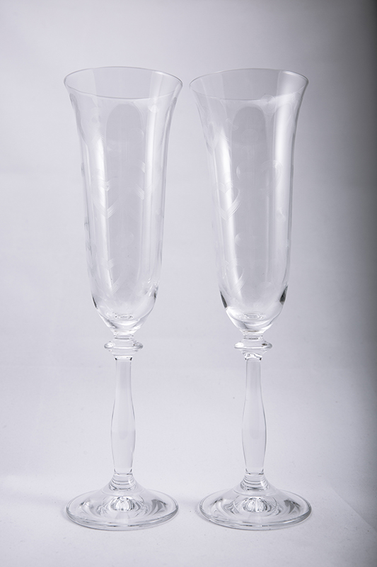 Crystal wedding glasses with engraved hearts