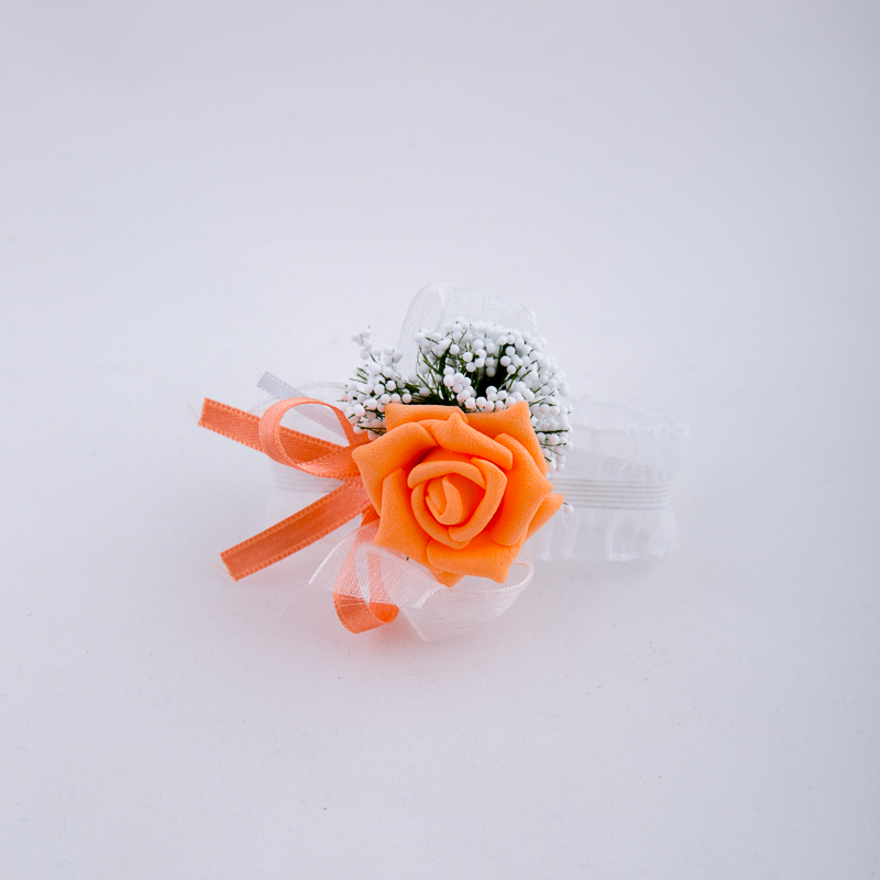 Bracelet with orange rose and ribbons