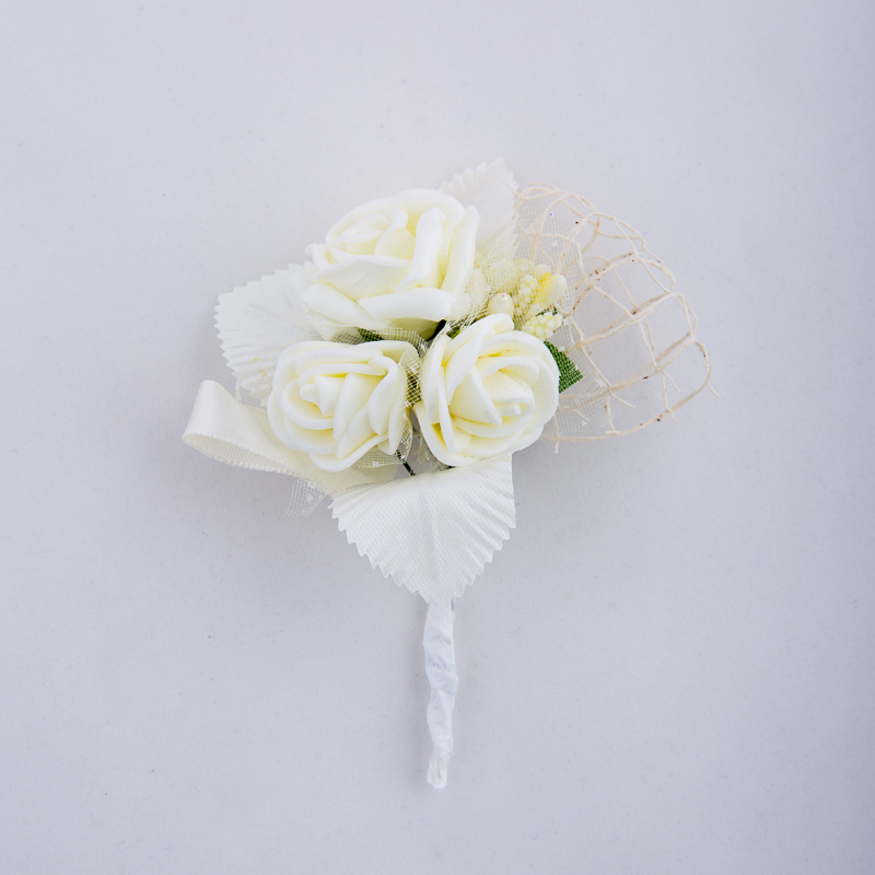 Boutonniere with three roses and net